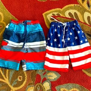 Two pairs of boys swimming trunks. Both size 14-16.
